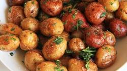 New potatoes in skins, baked in the oven